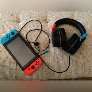 Gently used Nintendo switch and headphones.